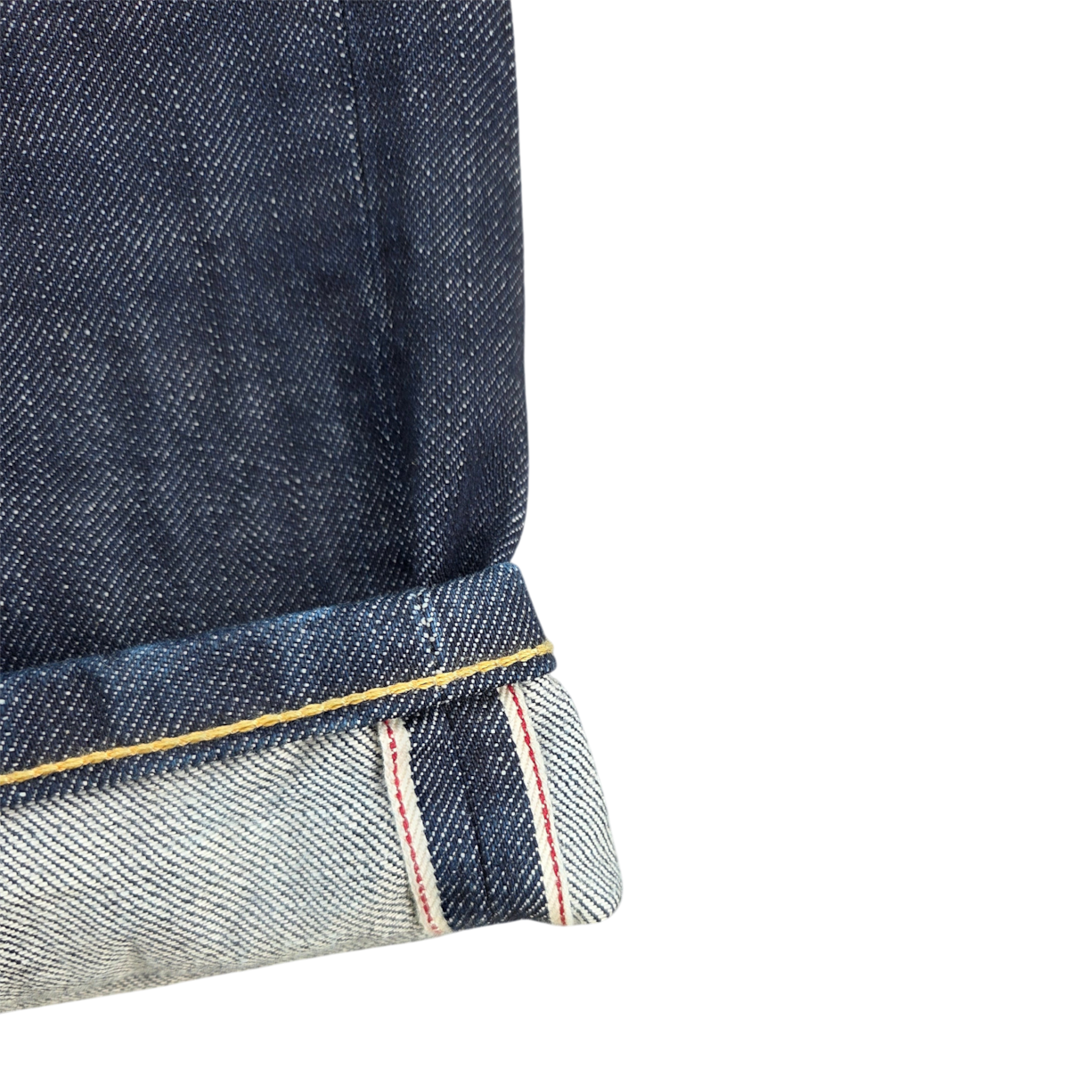 milworks.momF Studio M9 relaxed indigo selvedge denim jeans with a cuffed hem showing red line selvedge detail