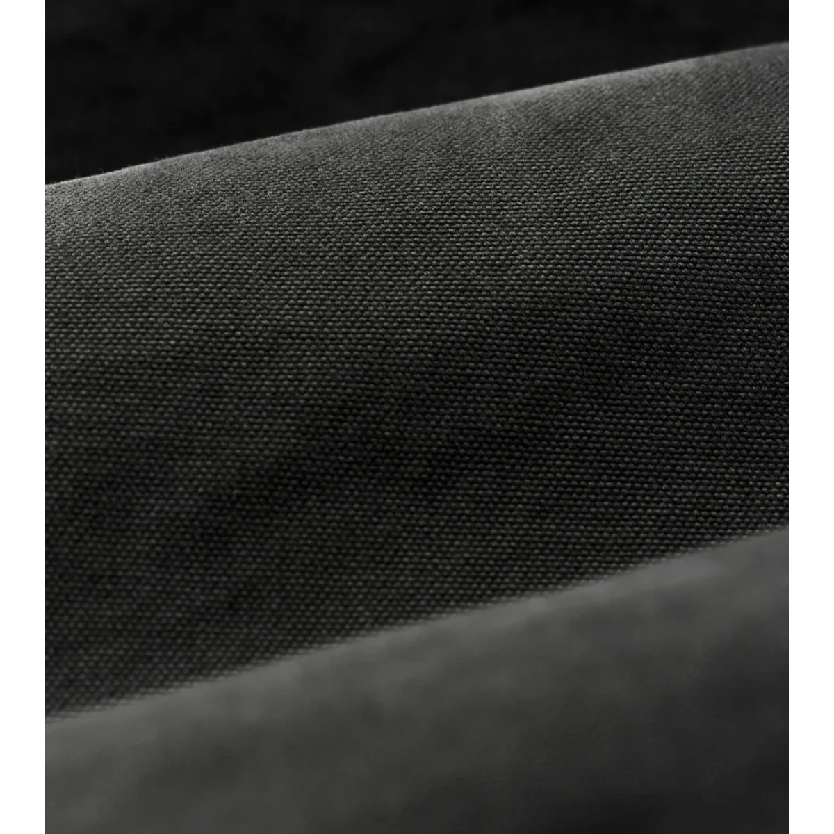Close-up of MILWORKS Insulated Canvas Outfitter Jacket in peat showing the durable, tightly woven canvas texture.