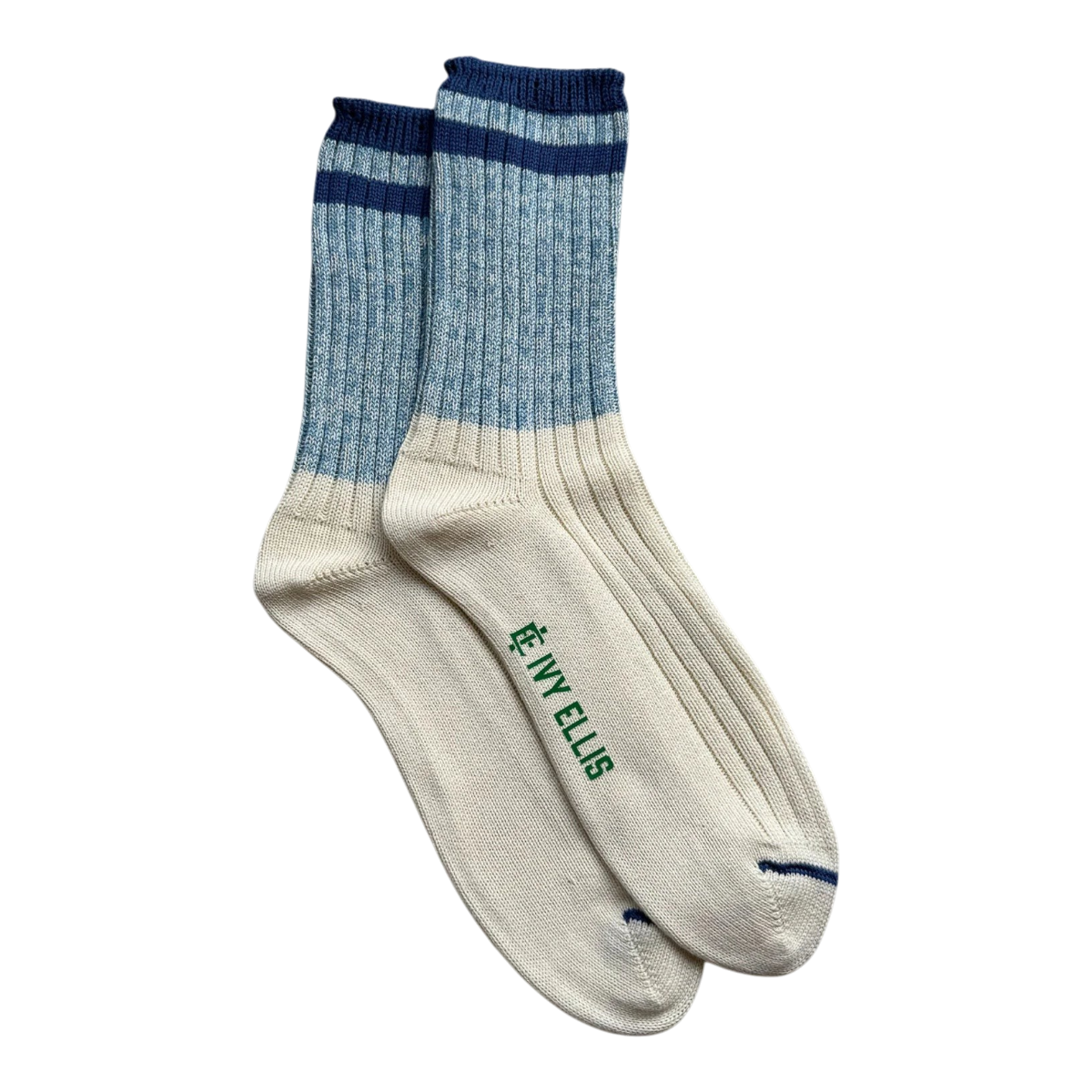 MILWORKS Ivy Ellis Makalu crew socks in denim-blue marl with navy striped cuffs and cream heel and toe.