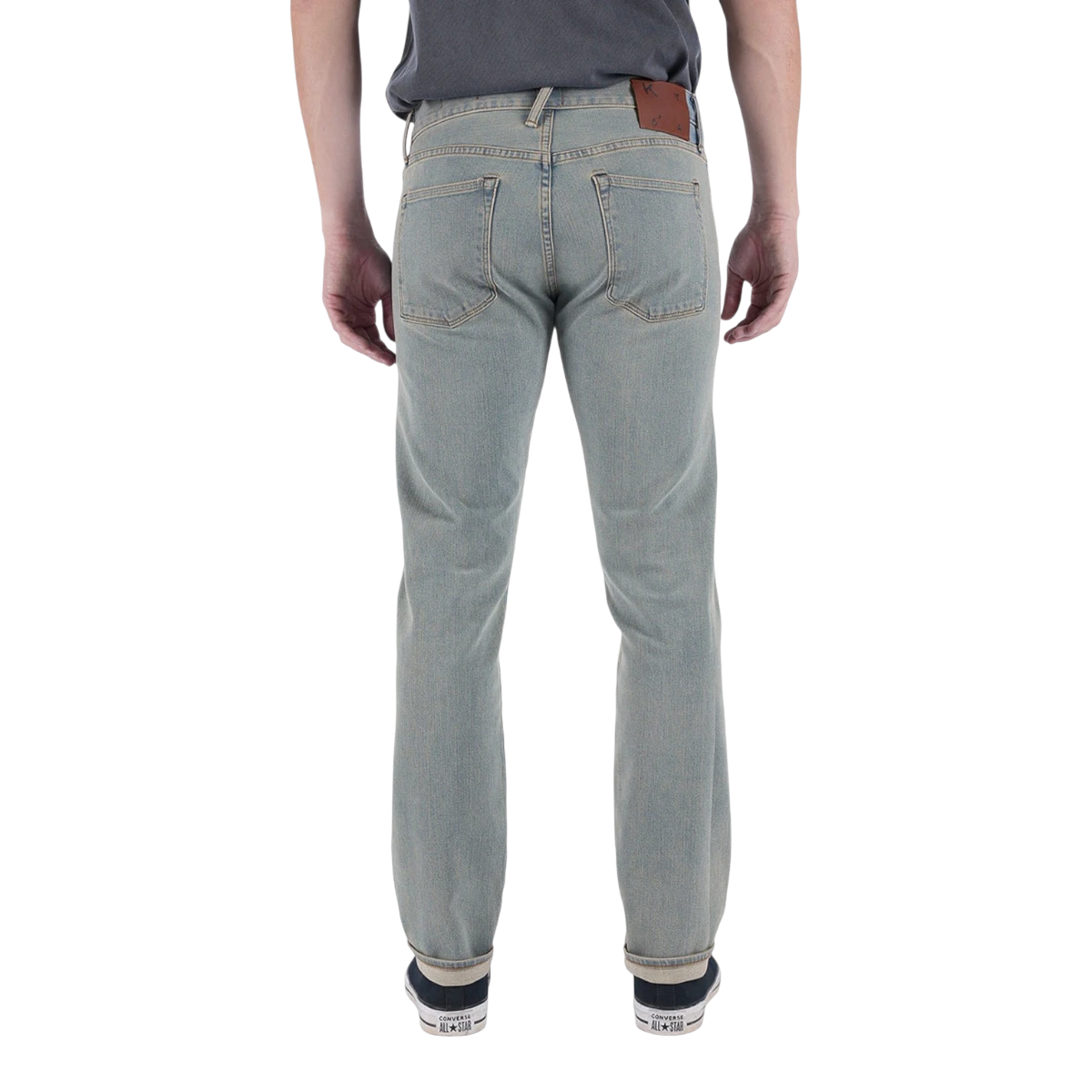 MILWORKS Pen Slim 10.5oz Sven light wash denim jeans featuring a slim fit and leather back patch, back view