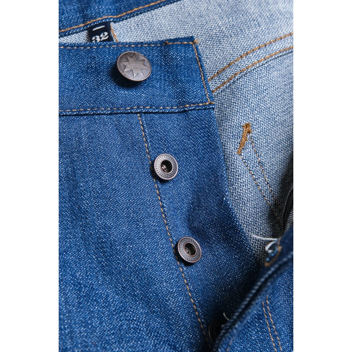 MILWORKS Portola Classic Taper jeans in vintage blue selvedge denim with button fly and custom star rivets.