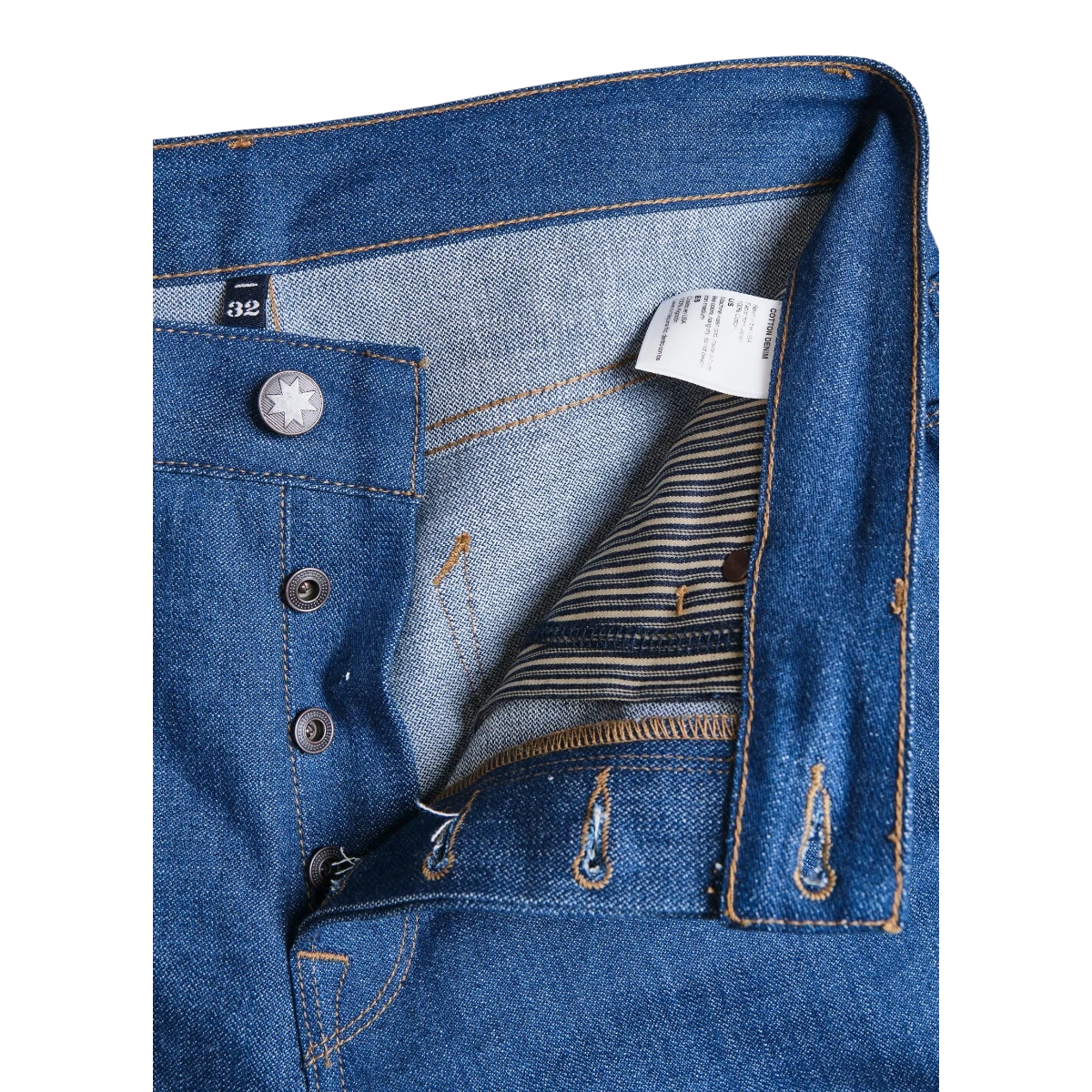 MILWORKS Portola Classic Taper jeans in vintage blue 12oz Japanese selvedge denim with button fly and striped pocket bags.