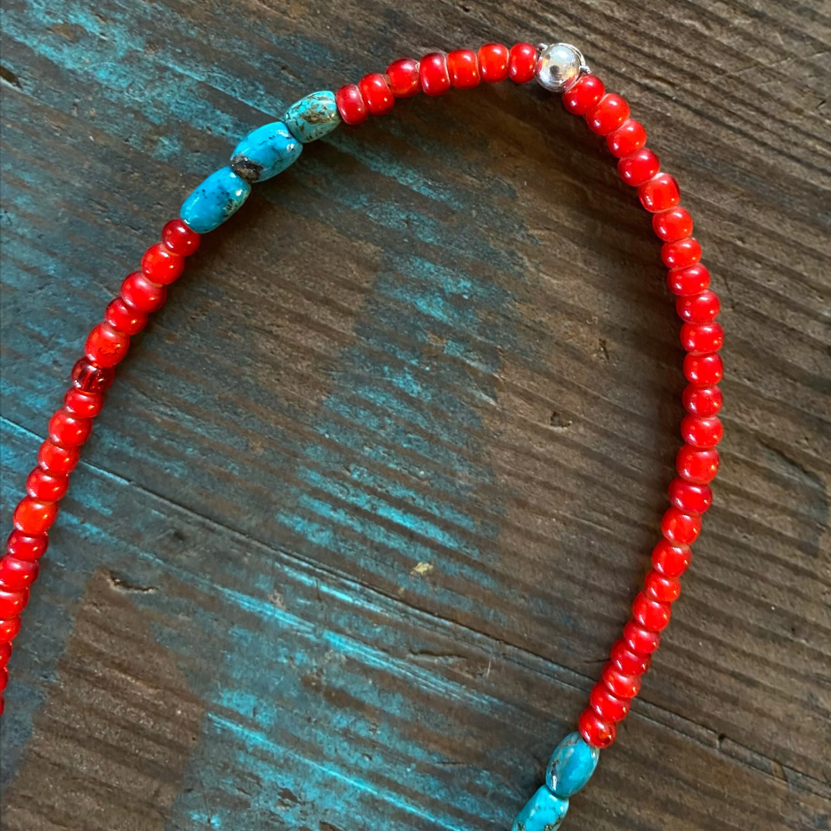 MILWORKS necklace featuring vintage red glass White-Heart beads and genuine turquoise beads on a sterling silver clasp