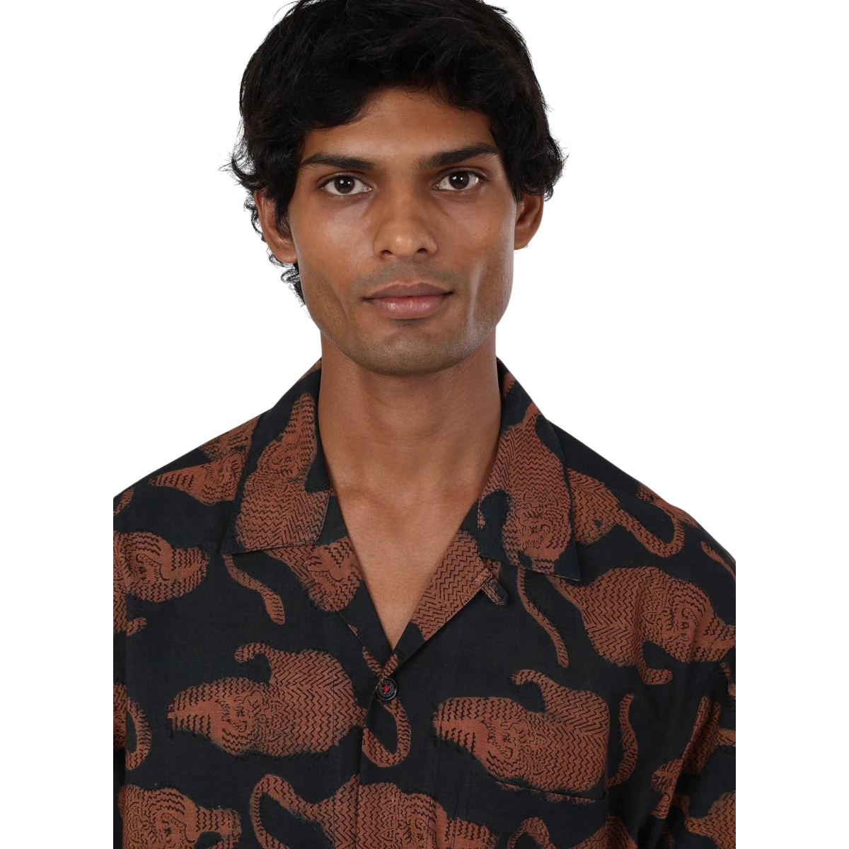 MILWORKS Ronen short sleeve shirt in black with a brown hand block print of leaping tigers. Features a camp collar and corozo buttons.