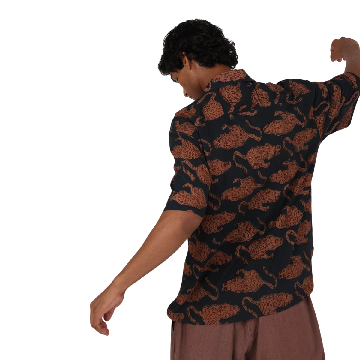 MILWORKS Ronen short sleeve shirt in black with a repeating hand block print of brown tigers. Features a camp collar and relaxed fit.