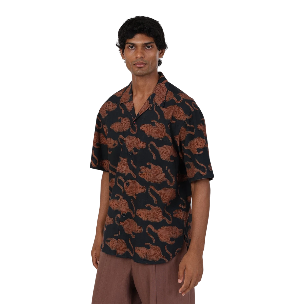 MILWORKS Ronen short sleeve shirt in black with a brown hand block print pattern, featuring a camp collar and relaxed fit.