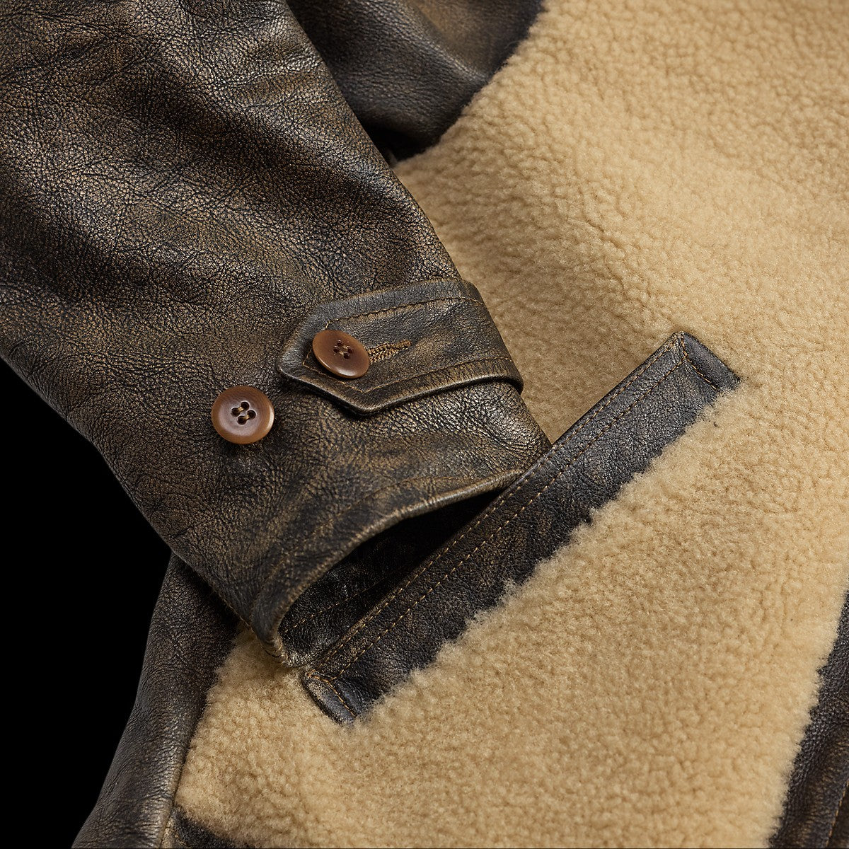 MILWORKS RRL vintage brown leather moto jacket with beige shearling lining and buttoned sleeve cuff detail