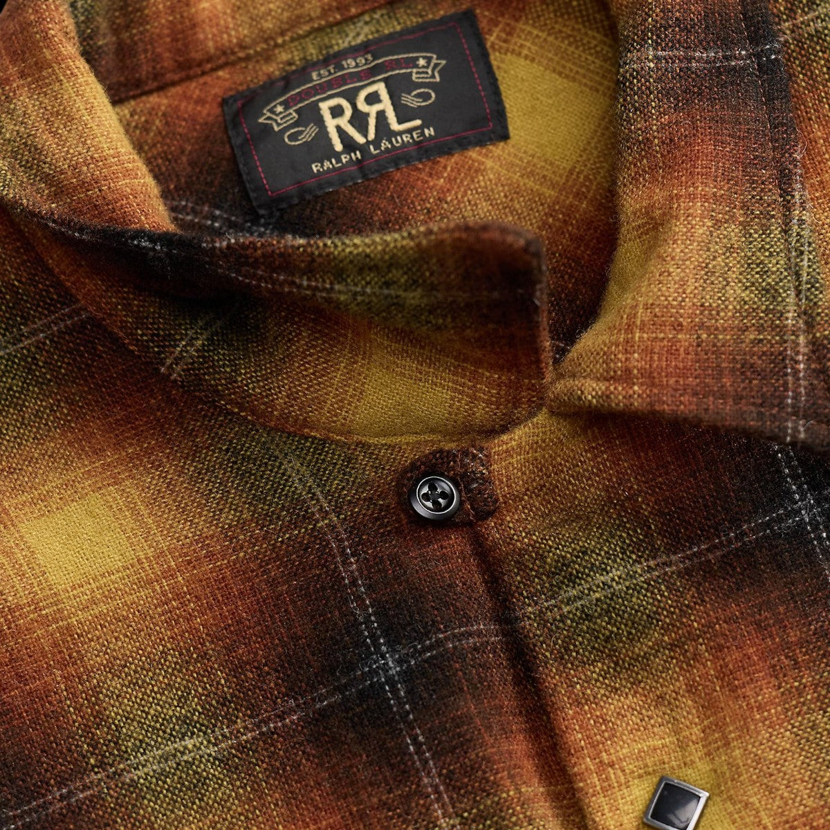 MILWORKS RRL plaid camp shirt in orange and yellow wool-blend fabric with a mother-of-pearl button at the collar