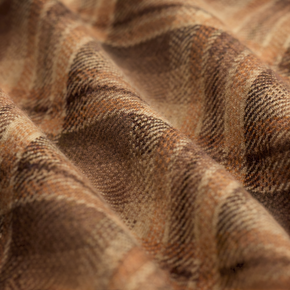 MILWORKS RRL plaid wool workshirt sweater in tan and rust tones with a soft textured fabric close-up