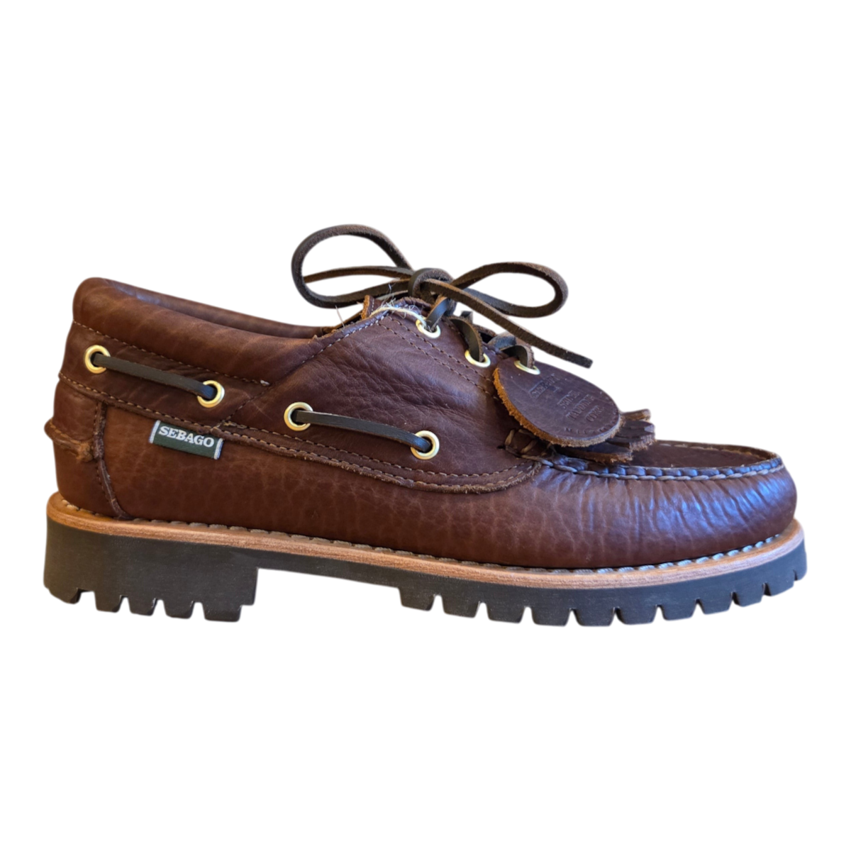 MILWORKS Sebago Acadia Artisan Momoth dark brown leather boat shoe with a rugged lug sole and tassel detail.