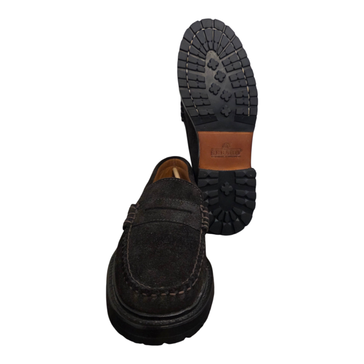 MILWORKS Sebago Dawson dark brown suede penny loafers with a rugged lug sole, shown from front and bottom angles.