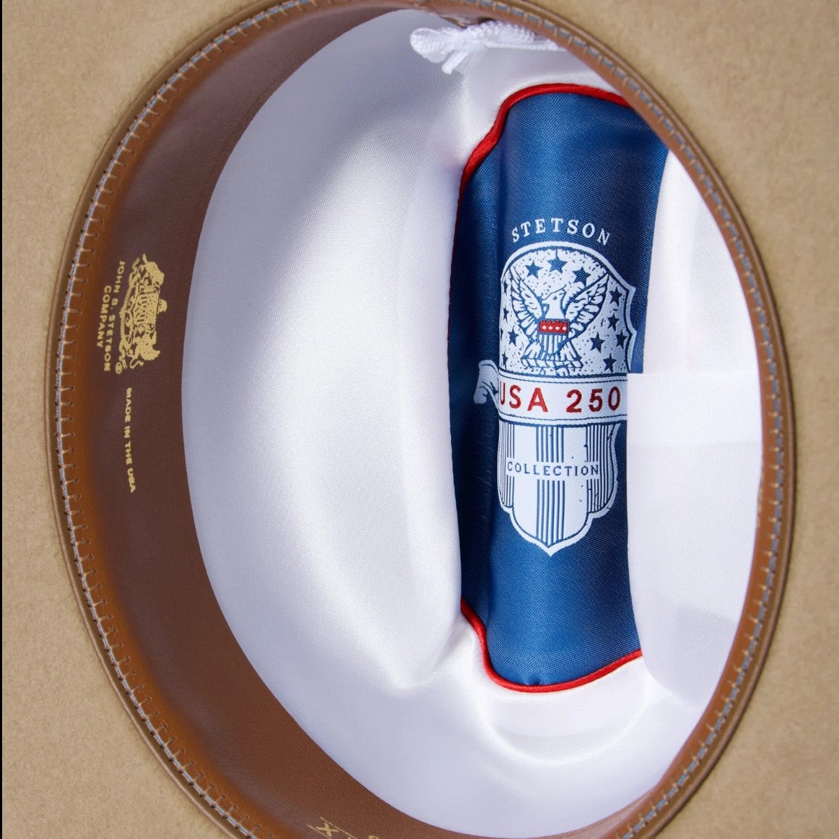 MILWORKS Stetson Open Road 6X USA 250 Edition hat interior featuring a patriotic blue satin liner and leather band.