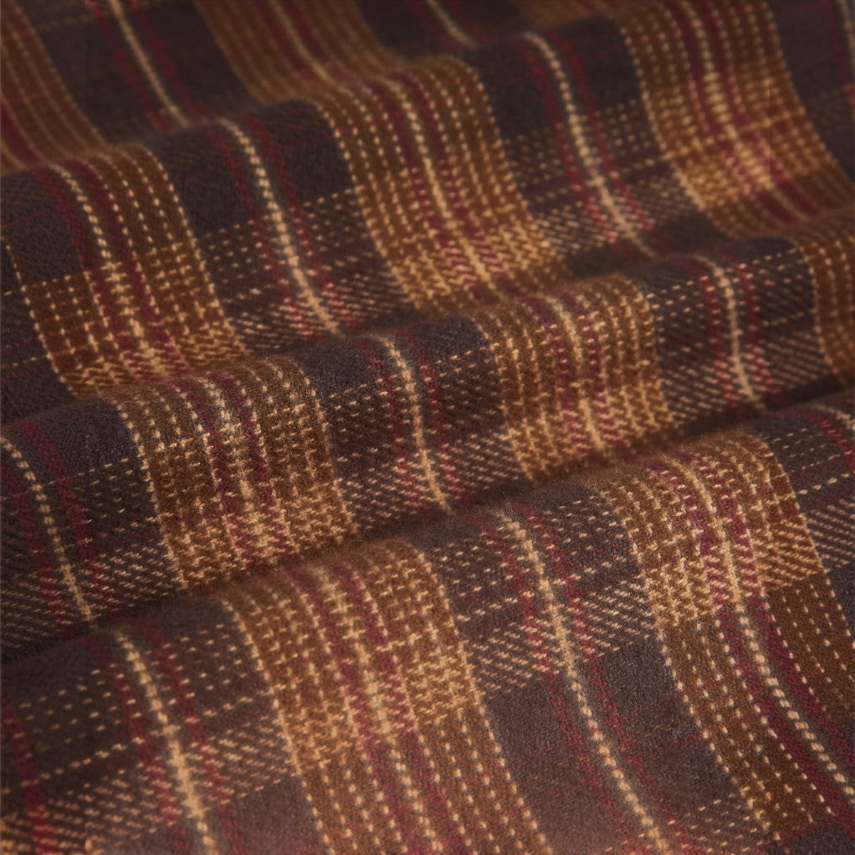MILWORKS Trigo plaid flannel shirt in brown and tan cotton fabric with a soft brushed texture