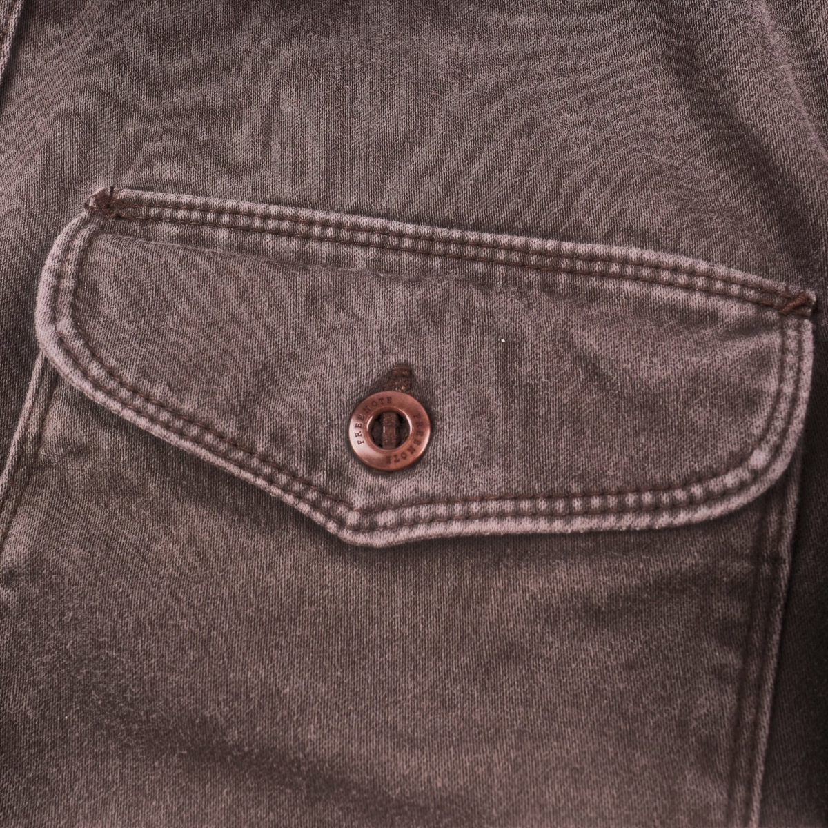 MILWORKS chocolate brown Japanese sateen twill utility shirt featuring an oversized pocket and Corozo button detail
