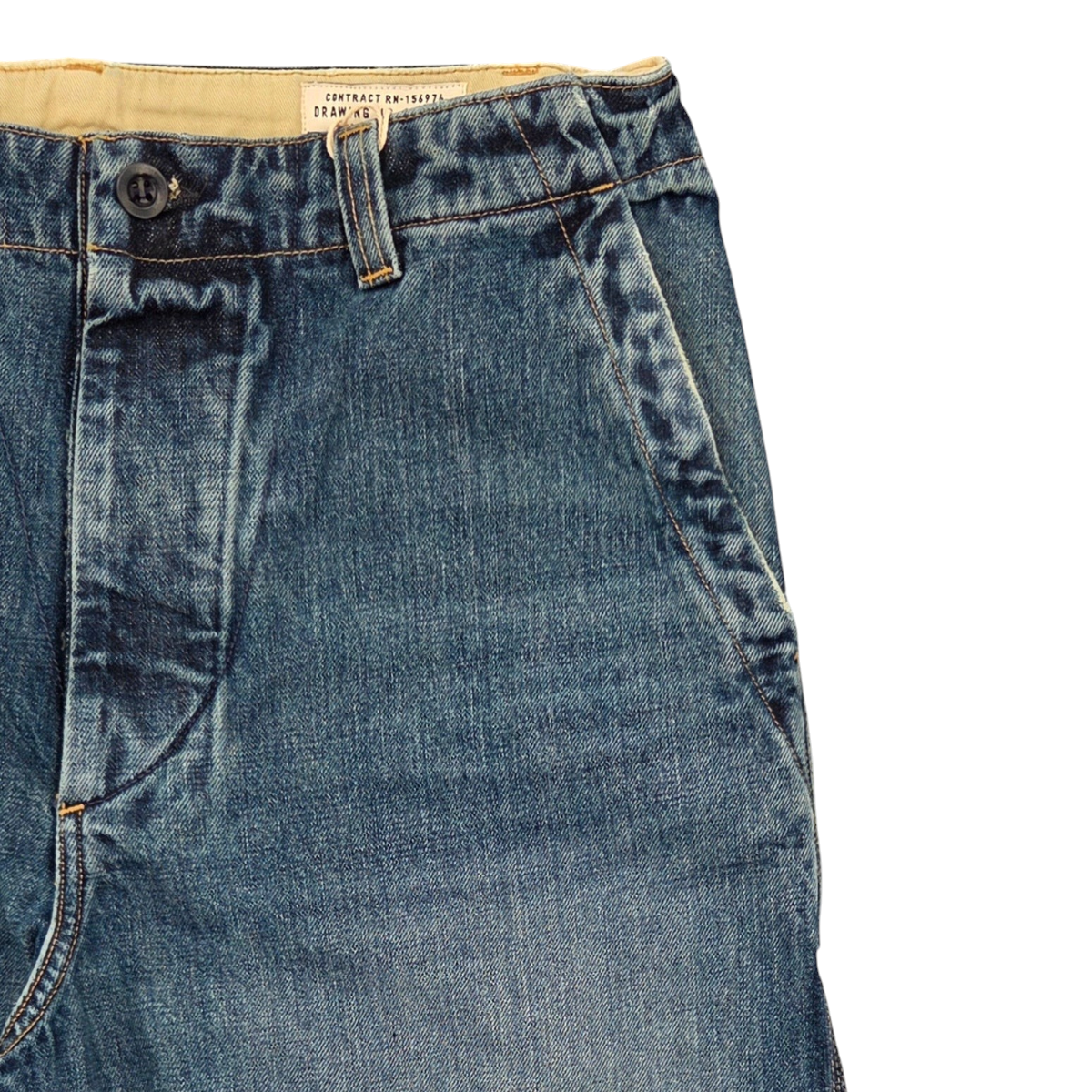 MILWORKS washed denim carpenter pants featuring a high rise, wide leg, and durable triple-needle stitching detail.
