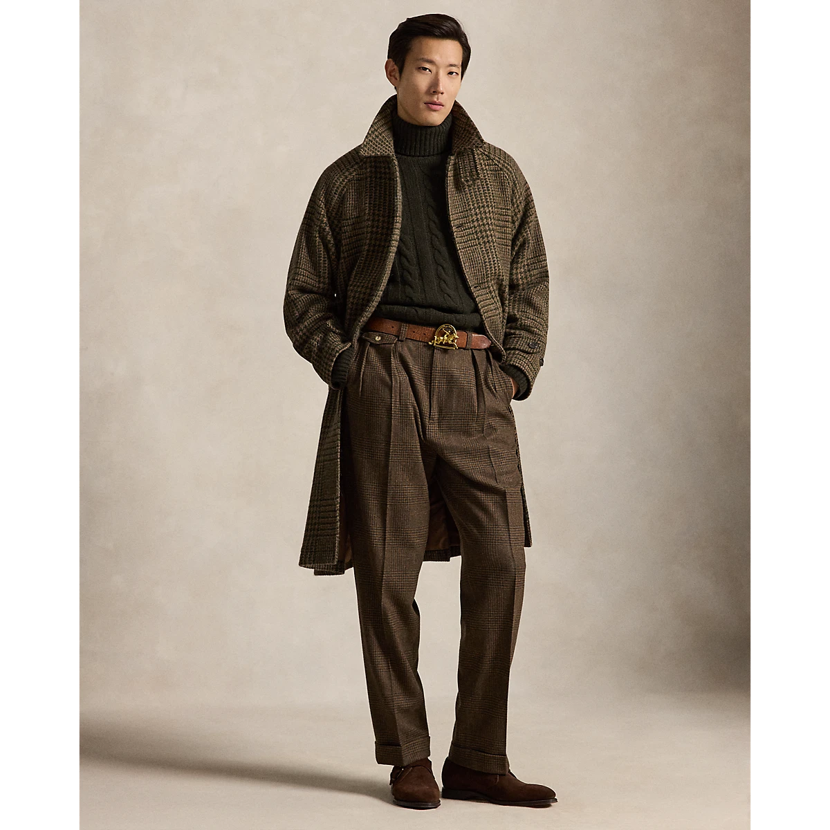 MILWORKS Whitman relaxed fit pleated trousers in honey brown glen plaid worn with a matching coat and dark sweater
