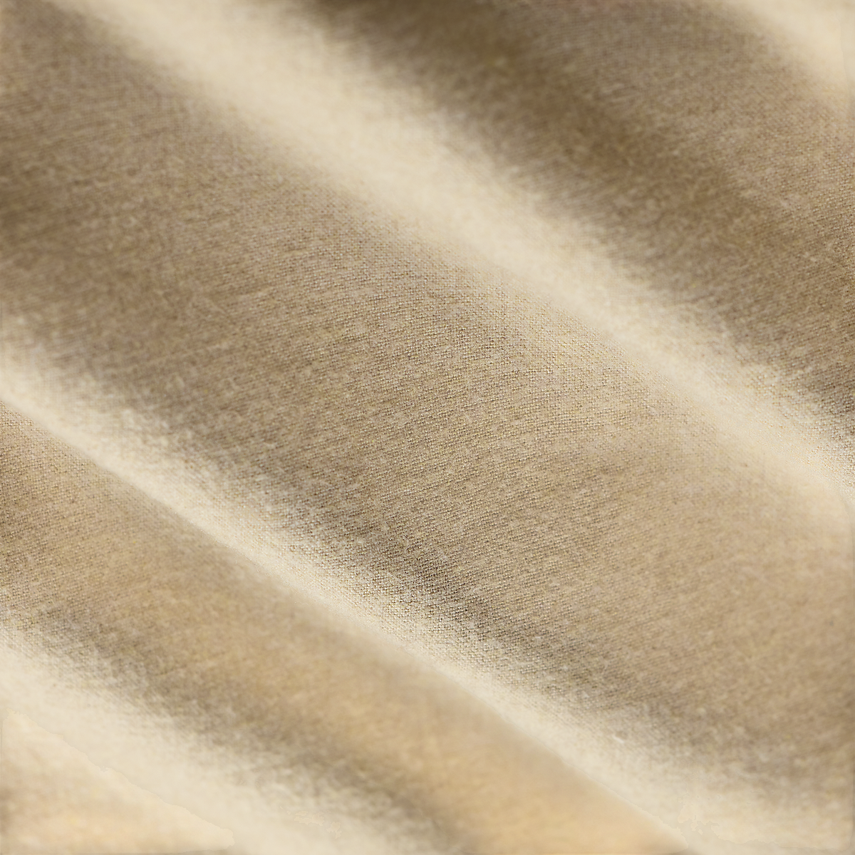 Close-up of the grey and cream woven fabric texture from a MILWORKS RRL sport shirt