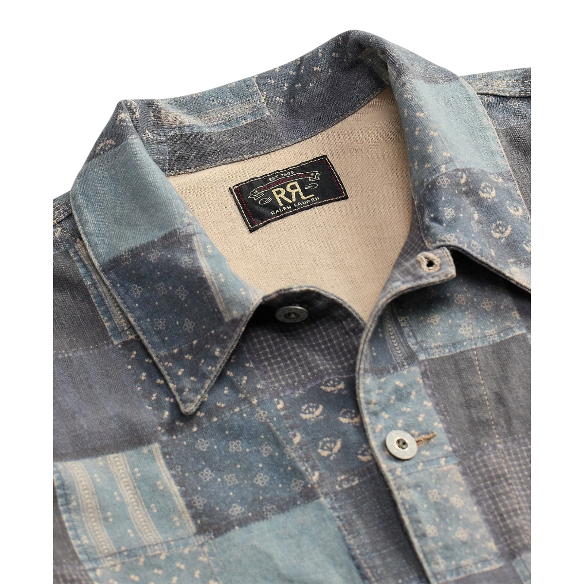MILWORKSH navy multi patchwork-print cotton jersey work jacket with metal buttons and a faded wash.