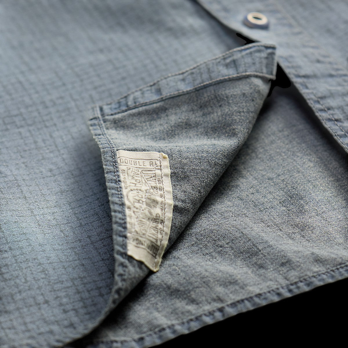 Double RL blue navy woven cotton workshirt with a faded check print and vintage-style interior brand label